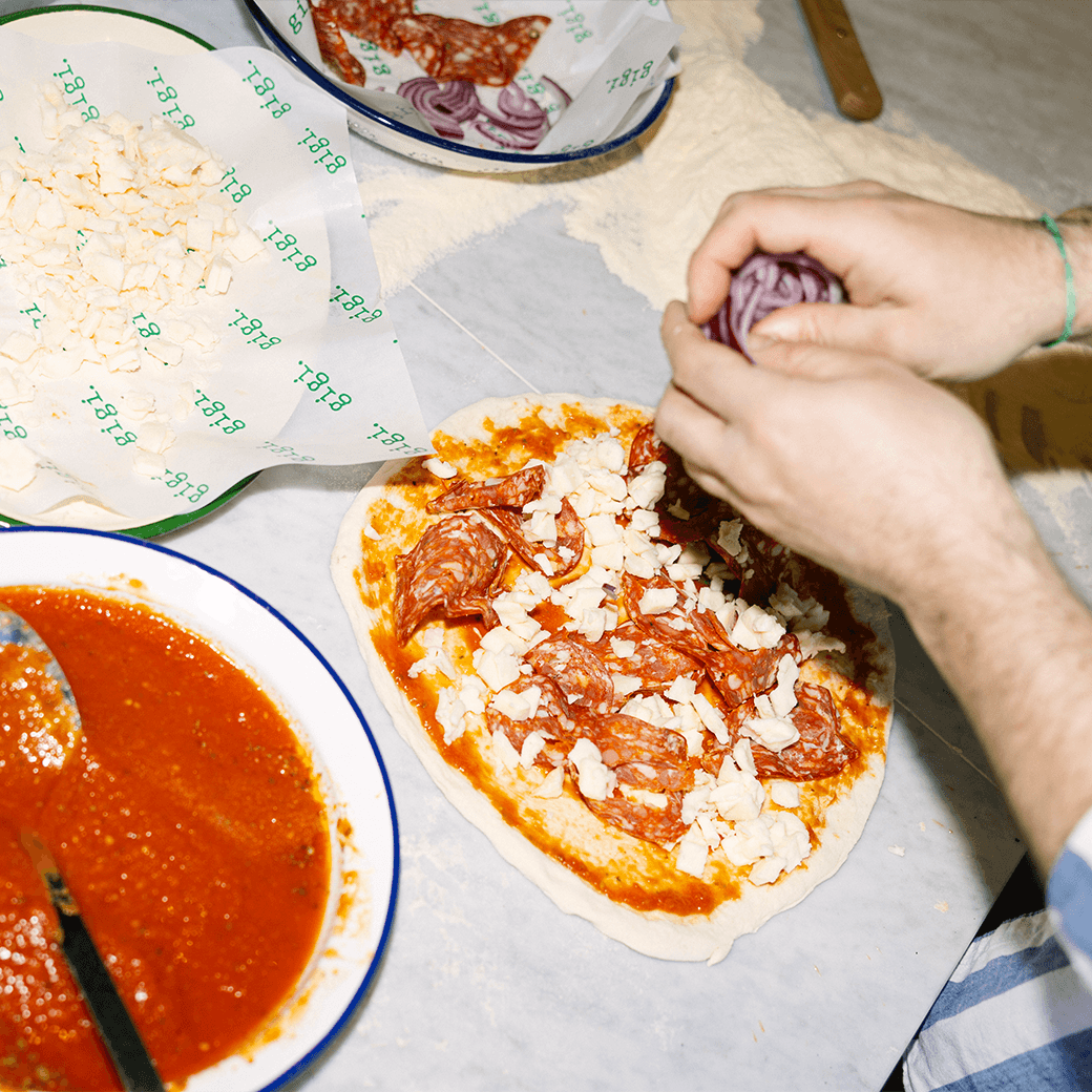 Handgemachte Pizza — frisch zubereitet bei gigi.